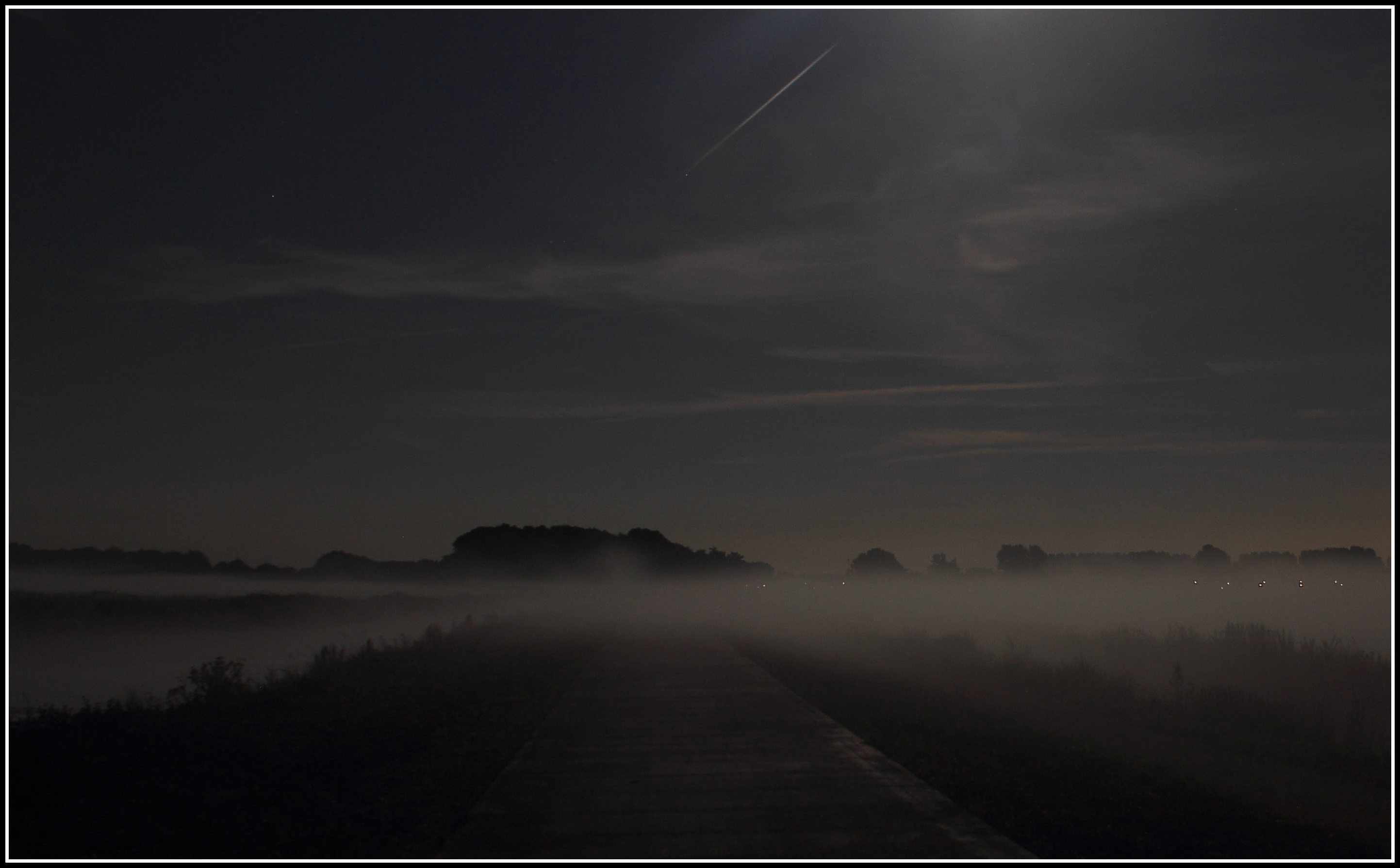 Volle maan en mist.