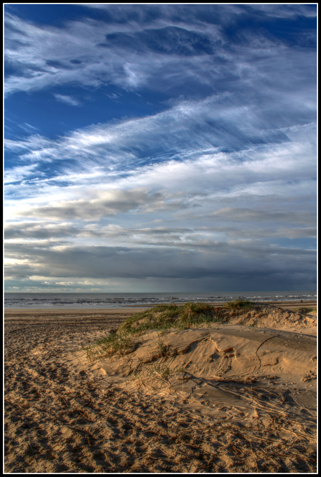 Zonsondergang strand.