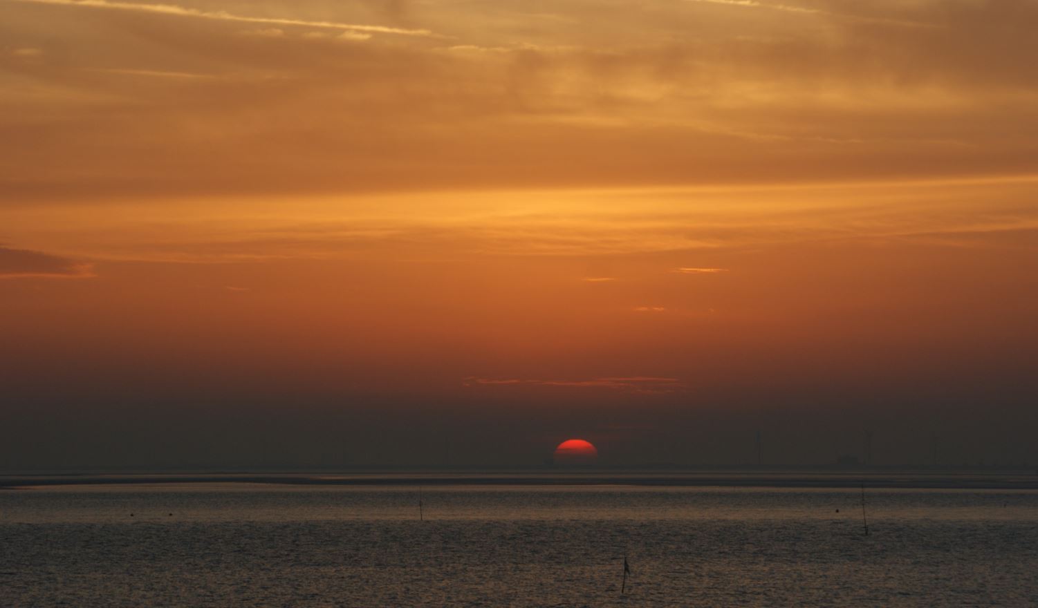 Uitzicht vanaf de Oosterschelde dijk, zonsondergang