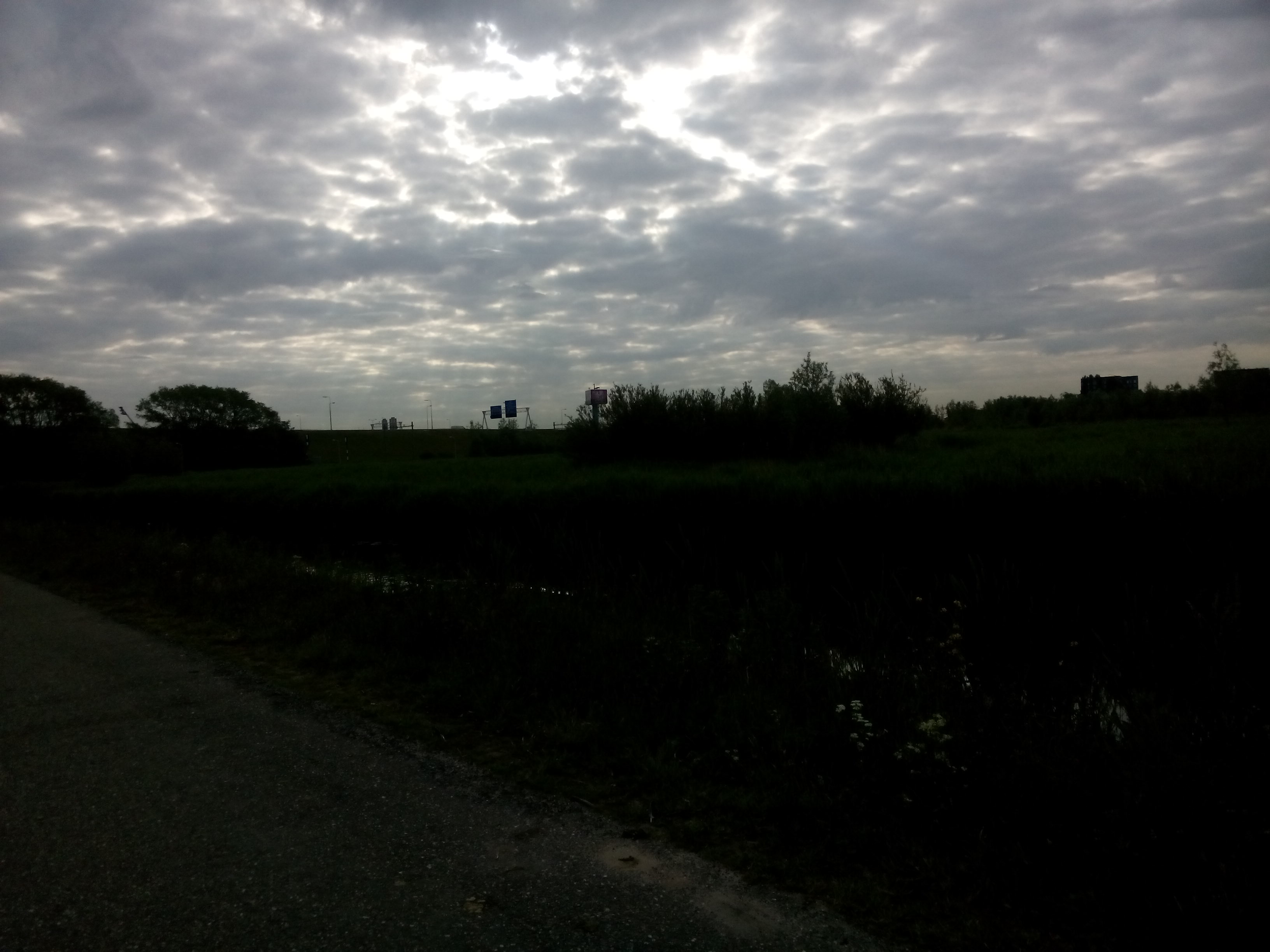 Zon door de wolken