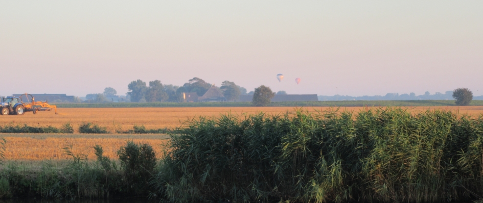 Ondergaande zon.              (Wedstrijdfoto) - Weer en landschap - 