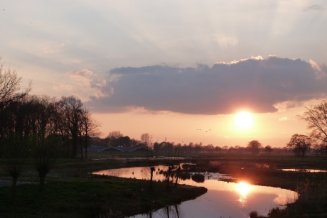 Zonsondergang langs de doorbraak