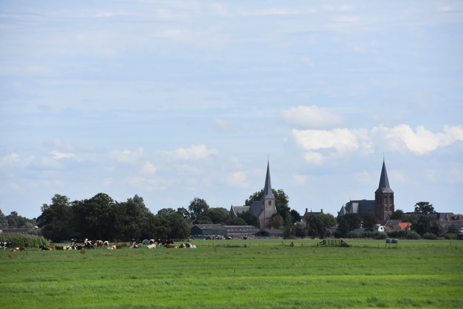 Zicht op de kerktorens van Benschop - Weer en landschap - 